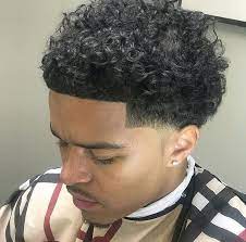 It is similar to a crop haircut with blunt fringe and texture on top. Curly Mullet Takuache Novocom Top
