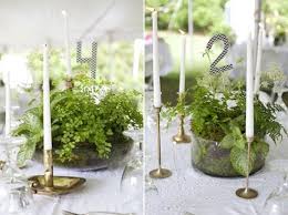 Rustic wedding centerpieces are works of art which arrest your sight, immerse guests in a warm and cozy atmosphere. Wedding Table Decorations Potted Plants Woman Getting Married