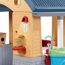 The interior of the playhouse has a garage theme. Go Green Playhouse Little Tikes