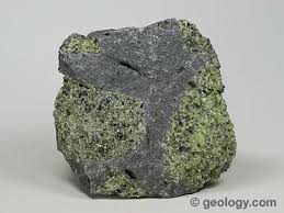 Vector mineralogy symbol, crystalline stone or. Olivine A Rock Forming Mineral Used As The Gemstone Peridot