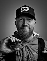 Earning a 100 mile finisher buckle at Six Days in the Dome