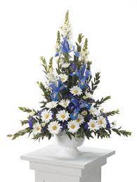 Funeral wreaths of roses, iris and white flowers. Blue And White Sympathy Arrangement H2366 Funeral Flowers Delivery In Toronto The Gta