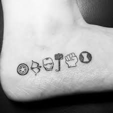 31 Marvel Tattoos That Will Make You Want To Be A Superhero Marvel Tattoos Avengers Tattoo Foot Tattoos