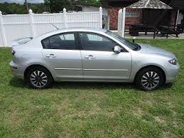 Image result for Sunlight Silver 2007 Mazda3