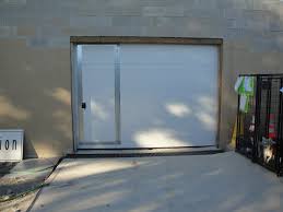 Is your garage door jammed down or up and youre trapped? Cedar Park Overhead Doors Double Insulated Steel Door With A Man Door Installed To Allow Access Without Opening The Garage Door Image Proview