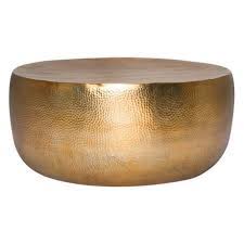 Featuring a gorgeous hammered surface, our coffee table can act as an outstanding centerpiece or can offer up a tray of snacks for your guests. Hammered Drum 95cm Coffee Table Drum Coffee Table Gold Coffee Table Brass Drum Coffee Table