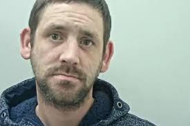 Thug attacked ex-partner after accusing her of having an affair