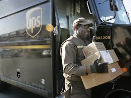 Ups Employee Making A Delivery Ups United Parcel Service Parcel