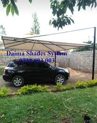 It is important to remember that this isn't the headroom of the carport but the clearance above the braces and the trusses. Canopies Car Parking Shades And Awnings Daima Shades System Price Quoted For A Three Cars Carport We Install And Maintai Shading System Car Parking Shades