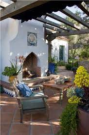 Patio With Pergola And Fireplace Outside A Spanish Mediterranean House Outdoor Rooms Outdoor Fireplace Spanish Style Homes