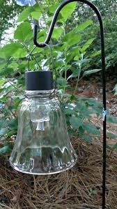 Check spelling or type a new query. Hanging Solar Light Too Cute Add A Dollar Tree Solar Light To A Ceiling Fan Shade Diy Garden Lights Hanging Solar Lights Garden Art Diy