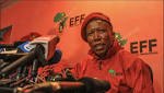 goes ground after Jacques Pauw