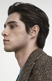 Everyone has the same haircut and androgenous flightsuit. Medium Length Mens Haircuts