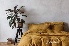 Mustard carries all the optimism of bright, primary gen z yellow, but with a more grounded and earthy energy, making it feel like more of an underdog. Why Mustard Yellow Bed Sheets Are Taking Over Gen Z Instagram Bedrooms