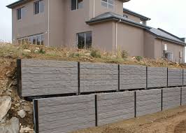 A retaining wall is used to confine soil to a particular area. Concrete Sleepers Retaining Walls Mt Barker Concrete Sleeper Retaining Walls Concrete Retaining Walls Concrete Sleepers