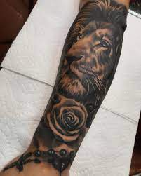Lion And Rose With Rosary For Today Underthegun Tattoo Losangeles Half Sleeve Tattoo Half Sleeve Tattoos Drawings Rose Tattoo Sleeve