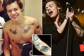 Harry styles tattoos updated 15/11/13 1) '17black' (james bond lucky gamble) on his left shoulder. Harry Styles Gallery Of Tattoos From Thoughtful Tributes To Secret Messages Mirror Online