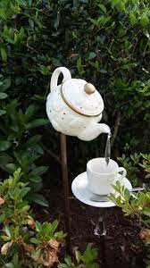Teapot Garden Feature Confessions Of A Serial Do It Yourselfer Teapot Garden Glass Garden Art Garden Features