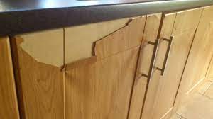 If you're gluing down a bigger piece of vinyl, then you'll need to use boards and c clamps on top to keep the pressure on the vinyl until the. Laminate Coming Off Kitchen Doors Boards Ie