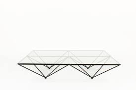 The harmonious shape of the structure brings a lot of elegancy to that coffee table. Vintage Italian Metal Table And Glass From 70s By Paolo Piva