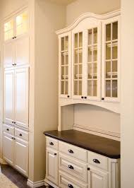 Cabinets Look Like Furniture Cream Cabinets With Glaze Glass Inserts Oil Rubbed Bronze Hardware Kitchen Remodel Furniture Kitchen Inspirations