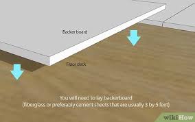 Laying floor tiles on cement sheet. How To Lay A Ceramic Or Porcelain Tile Floor With Pictures