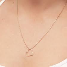 Necklace with heart pendant for women. Gold Heart Necklace Sideways Heart Necklace Love Layering Necklace Everyday Delicate Gold Filled Jewelry In 2020 Small Heart Necklace Sideways Heart Necklace Gold Triangle Necklace