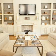 Need help designing your rectangular living room? Munger Interiors Living Rooms Built In Cabinets Built Ins Living Room Built Ins Ivory Built Ins Bookshelves Built In Traditional Family Rooms Home Decor