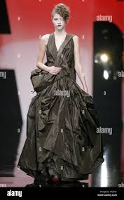 Vivienne Westwood Paris Ready to Wear S S Model Aleksandra Rastovic  brunette hair curled and piled on top of head wearing Stock Photo - Alamy