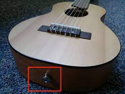 Make sure you thread the shoelace behind the nut and underneath the strings so that it doesn't get in the way while you play. How To Use A Guitar Strap Severn River Guitar