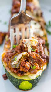 Philly Cheesesteak Stuffed Zucchini Boats Video Sweet And Savory Meals Recipe Healthy Beef Recipes Zucchini Philly Cheese Steak