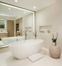 Mix a coat of bright white paint with wooden accents and brass for a delightful atmosphere. 32 Stylish Bathroom Mirror Ideas 2021 Updates