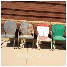 This gliding chair rocking chair is perfect for relaxation. 200 Metal Chairs Ideas Metal Chairs Metal Lawn Chairs Lawn Chairs