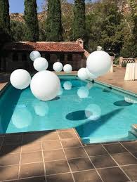 Jumbo Balloons Over This Pool Create A Magical Look For This Poolside Baby Shower Babyshoweridea Pool Wedding Pool Wedding Decorations Pool Party Decorations