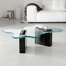 It offers more room to play around with the chair placement within your living room, and overall is easier to design around since you don't have hard lines or edges. Tonelli Splash Glass Coffee Table Living Room Furniture Ultra Modern