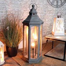 Buy online & pick up in stores shipping same day delivery include out of stock accent table lamps arc lamps banker lamps beacon lights buffet lamps cabinet lights can lights ceiling fans chandeliers clip lights desk lamps disco ball lights fairy string lights figurines floor lamps flush mounts island pendant lights. Tall Rustic Grey Wash Wooden Lantern Style Floor Lamp Lighting Rustic Home Decor Ebay