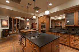As this kitchen attests, white cabinetry actually highlights the granite, rather than absorbing into it the way natural wood cabinetry can. Black Granite Countertops Styles Tips Video Infographic