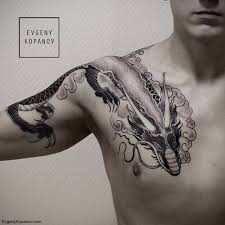 Dragon de style graphique sur le dos d'une dame. 130 Tatouages De Dragon Meilleurs Dessins Et Signification