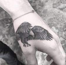 The appeal of this piece is its location, the thunderbird was said to create thunder with a flap of its wings, making the hands an ideal location for a thunderbird tattoo. Eagle Tattoo Hand Designs Novocom Top