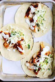 Spicy Fish Tacos With Cabbage Slaw Lime Crema - Wwwfoodesscom Recipe Spicy Fish Tacos Fish Tacos With Cabbage Recipes