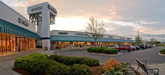 Dogs lounge beside cafe tables and proud owners parade their pups through downtown. Smithfield Carolina Premium Outlets Pet Friendly Travel