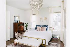 Feel like a diva in a room paneled in plush tufted creamy white and embellished with a color and form enhance this sophisticated feminine bedroom (newhouse.ideas). Jordan Interiors Home Decor Modern Feminine Bedroom Eclectic Bedroom