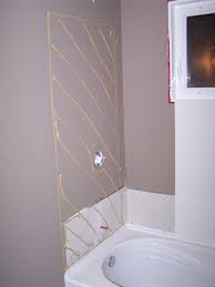 This old house plumbing and heating expert richard trethewey updates a bath. How To Install A Bath Tub Surround