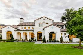 Black And White Spanish Style Home Exterior White Exterior Black And Brown Accents Spanish Style Homes House Exterior House Designs Exterior