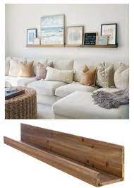 Rated 5 out of 5 stars. 32 Coastal Gallery Walls Inspiration Ideas To Create A Compelling Wall Art Display Coastal Gallery Wall Living Room Decor Neutral Family Room Wall Art