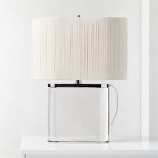 This simple floor lamp sits at 61 in height and provides a unique style. Modern Silver Lamps Cb2