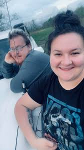 Can any one edit the glar off my husband's face and make this brighter for  me please and thank you. If possible smooth out his belly