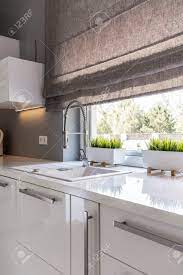 See more ideas about blinds, blinds inspiration, modern blinds. Image Of High Gloss White Modern Kitchen With Window Roller Blinds Stock Photo Picture And Royalty Free Image Image 60709505