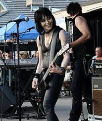 Jett is best known for her work as the frontwoman of her band joan jett & the blackhearts, and for earlier founding and performing with the runaways, which recorded and released the hit song cherry bomb.with the blackhearts, jett is known for her. Joan Jett Wikipedia