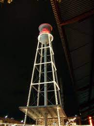 A splendid medieval castle towering over the city of durham. American Tobacco Lights Water Tower For Holidays Capitol Broadcasting Company